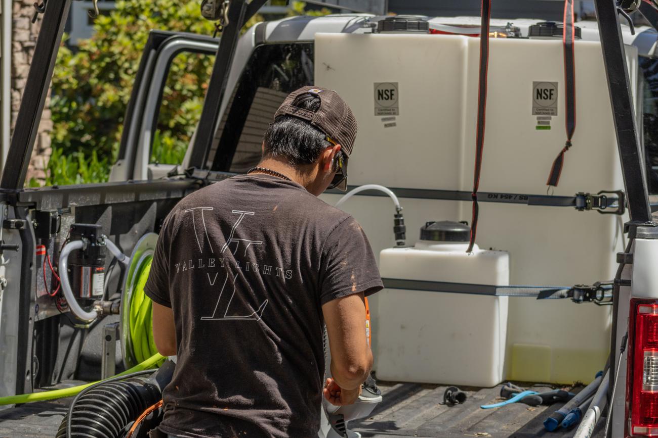Valley Lights crew loading equipment from the truck