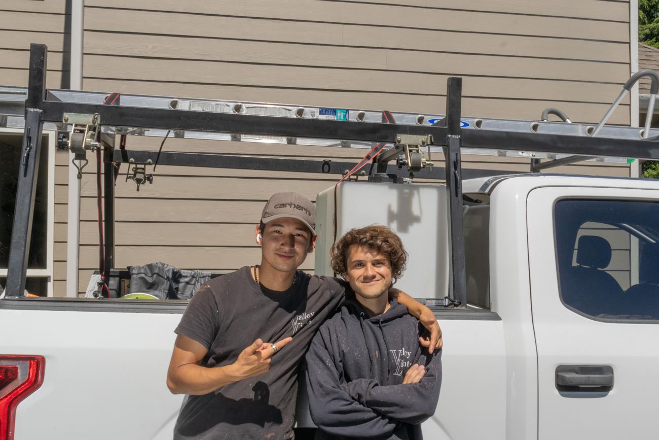 The Valley Lights crew by the work truck